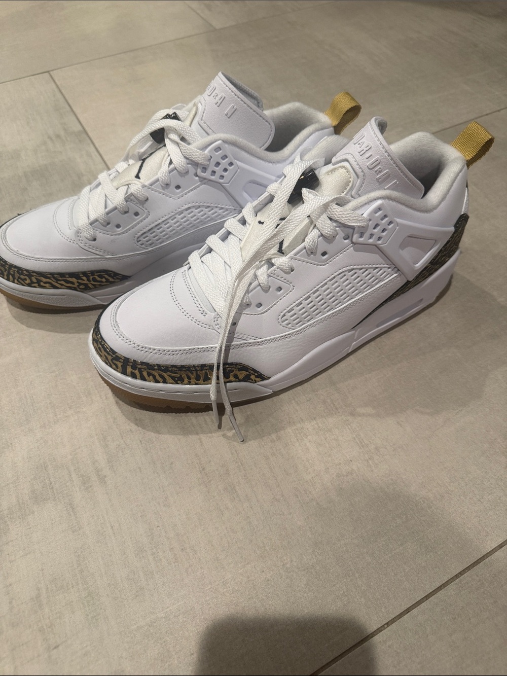 Jordan Spizike Low
White Metallic Gold size 10.5 brand new